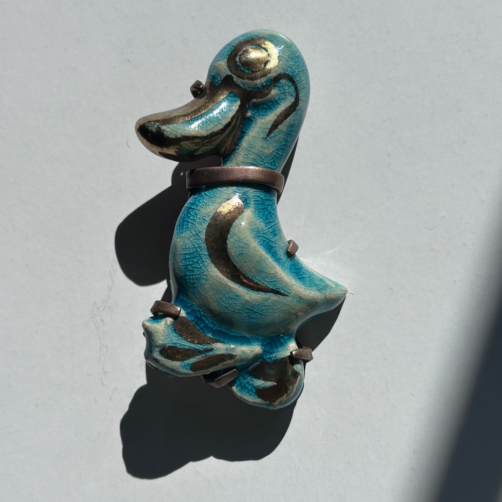 Ceramic antique brooches